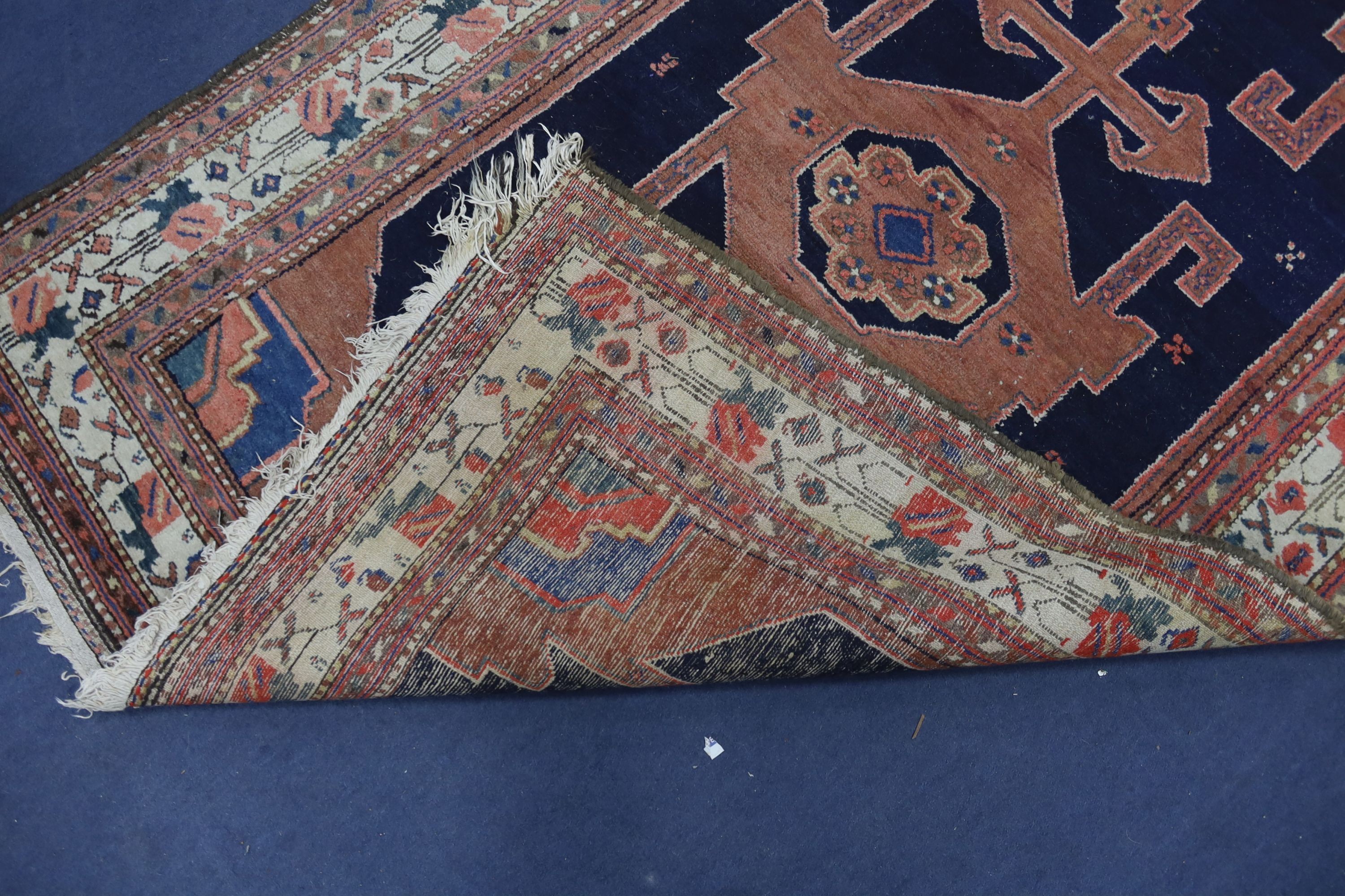 A Hamadan blue ground rug, 197 x 132cm